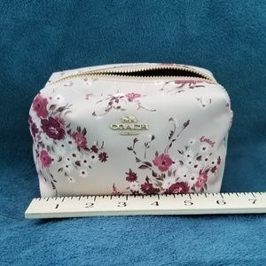 Small Floral Print Coach Cosmetic Case.